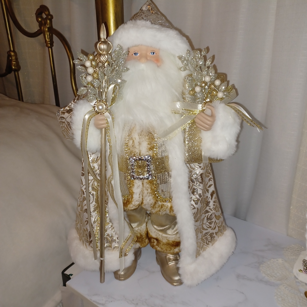 Elegant Gold and White Santa Figurine